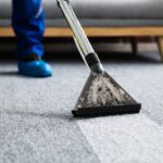 Janitor,Cleaning,Carpet,With,Vacuum,Cleaner,At,Home