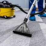 Photo,Of,Janitor,Cleaning,Carpet,With,Vacuum,Cleaner